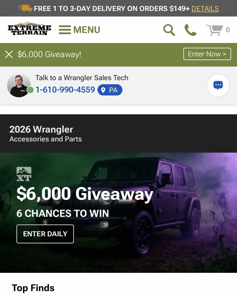 ExtremeTerrain storefront on mobile, showing the logo in the header, giveaway banner and navigation